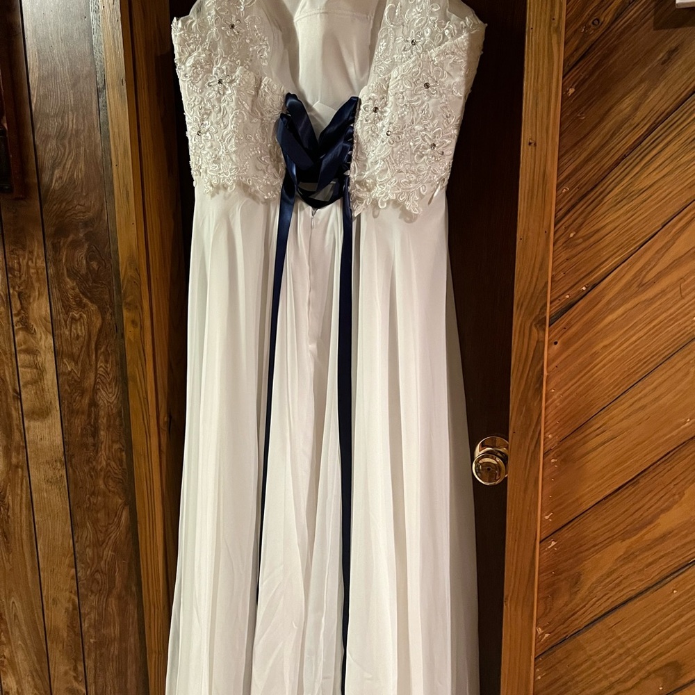 brand new wedding dress no tags. Paid $350 with alterations. Asking $150 obo